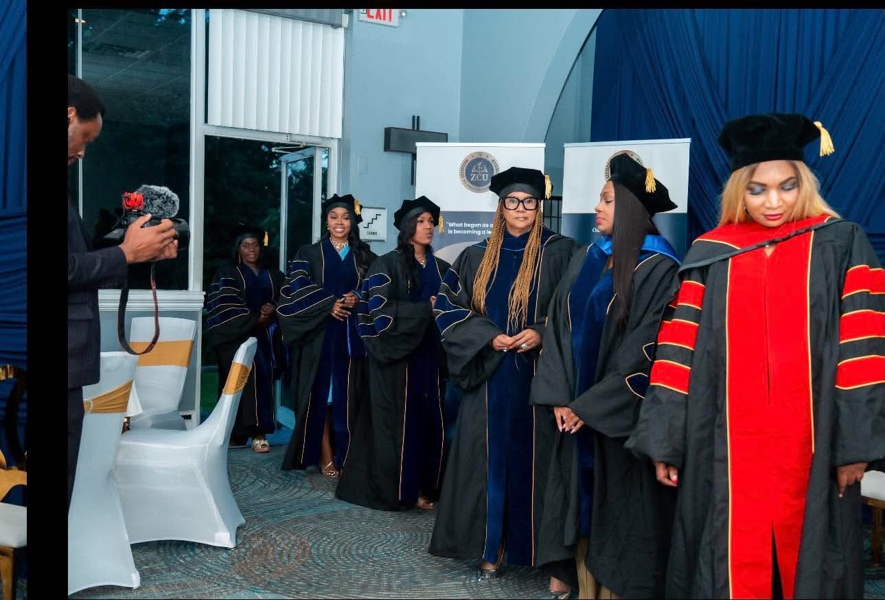Graduates lining up for the processional as the ceremony is filmed
