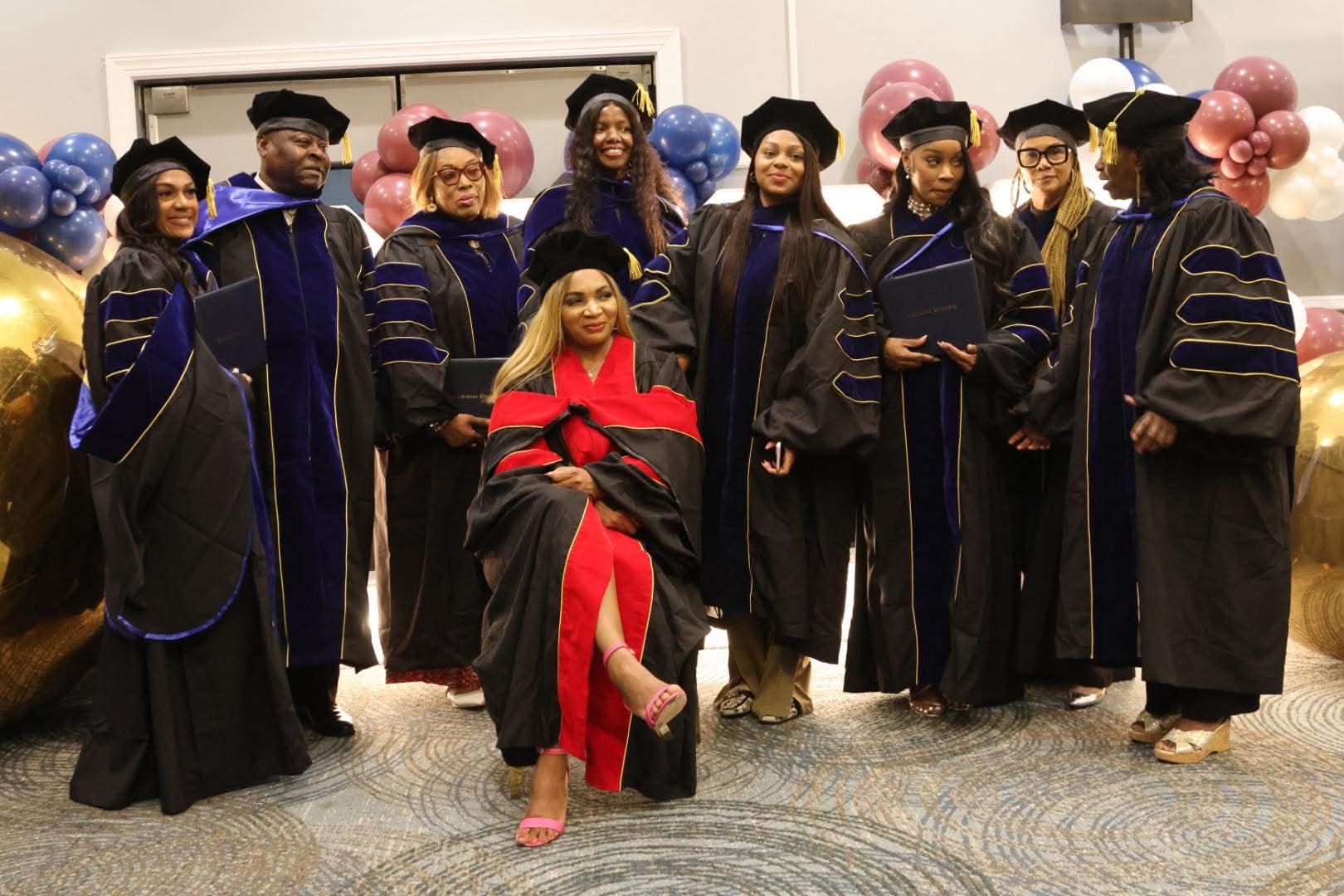 Zoe Christian University graduates in blue and gold regalia
