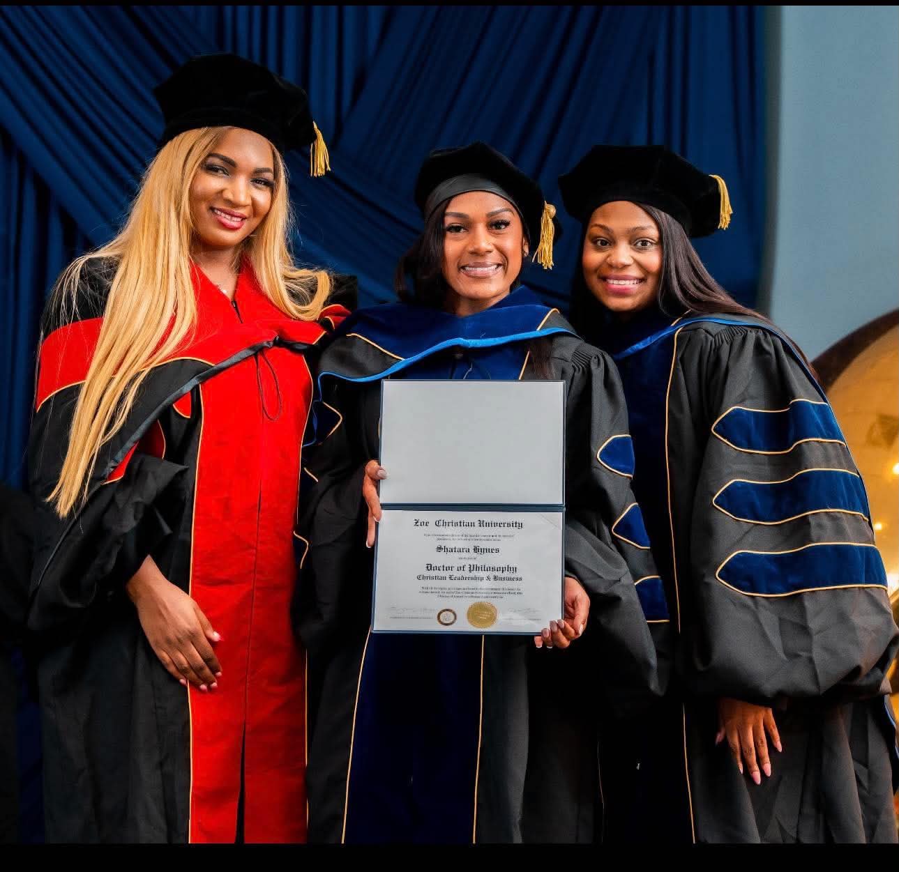 A Zoe Christian University doctoral certificate presented on stage