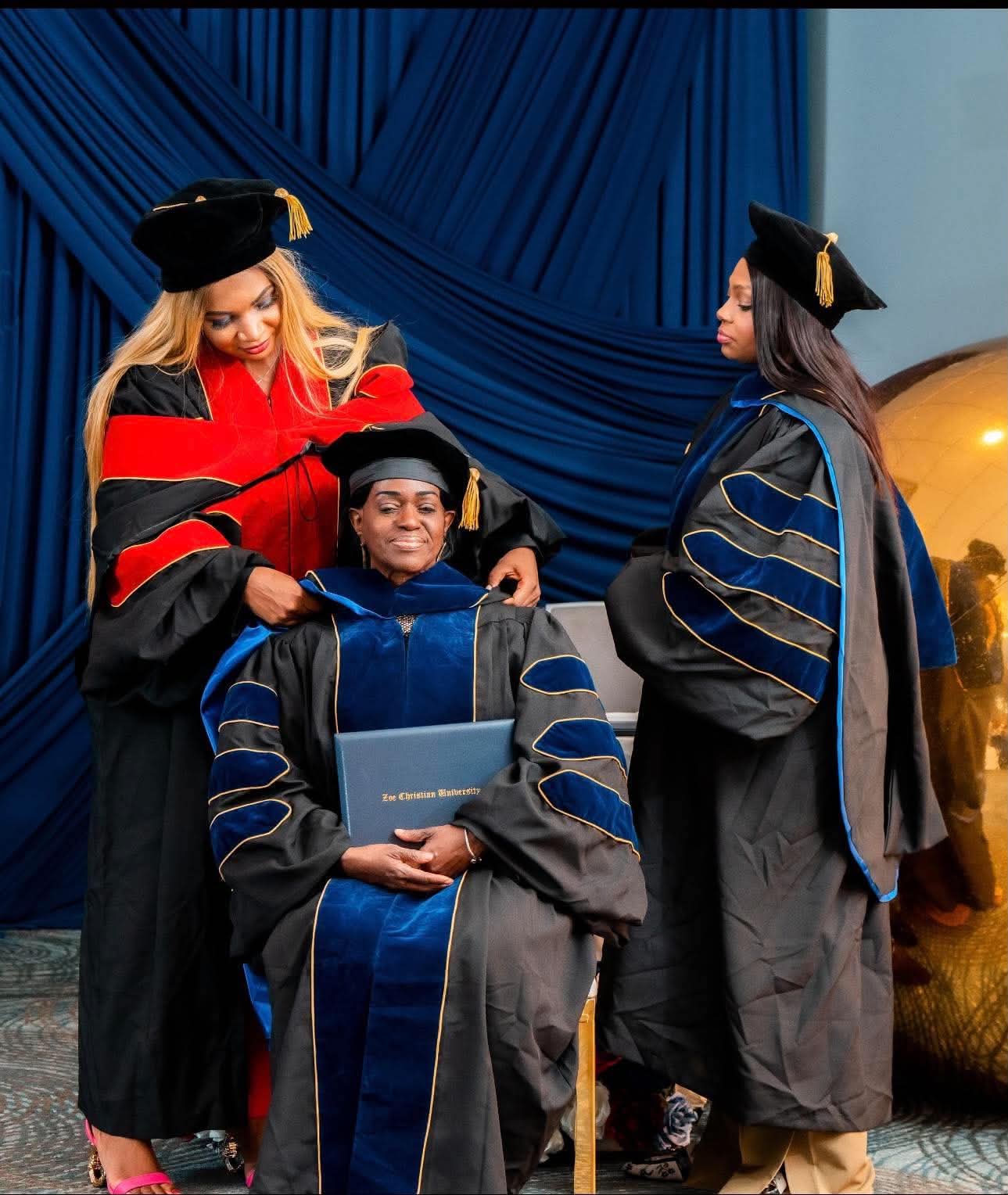 Doctoral hooding at a Zoe Christian University commencement