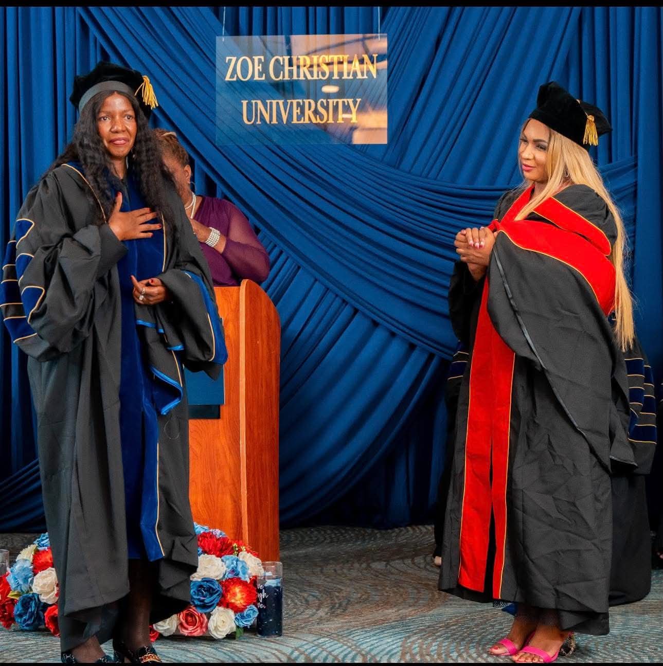 Honoree receiving recognition at the Zoe Christian University podium